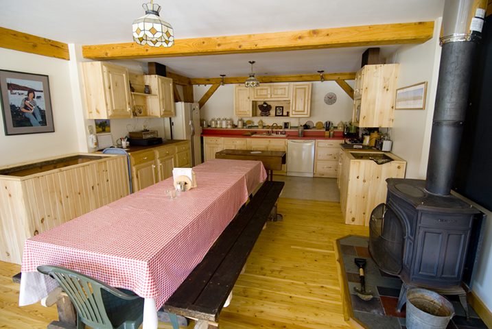Kitchen and eating area at Mahoosuc Mountain Lodge Bear River Valley Newry Maine