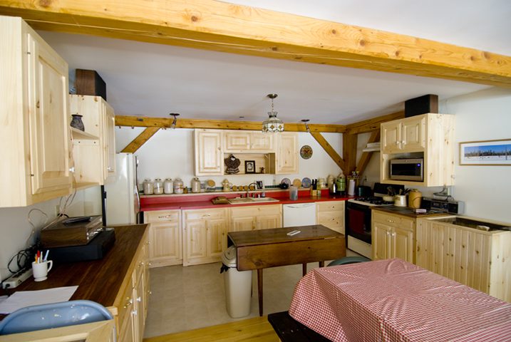 Kitchen and eating area at Mahoosuc Mountain Lodge Bear River Valley Newry Maine