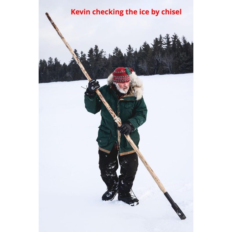 Kevin checking the ice by chisel